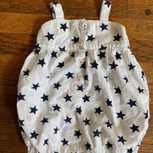 Navy star baby romper with neon pink stitching